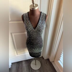 Chic Black Sleeveless Dress with Glittering Details